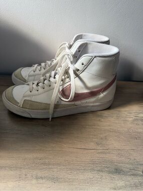 Nike Women's High-Top Sneakers in White with Pink Swoosh
